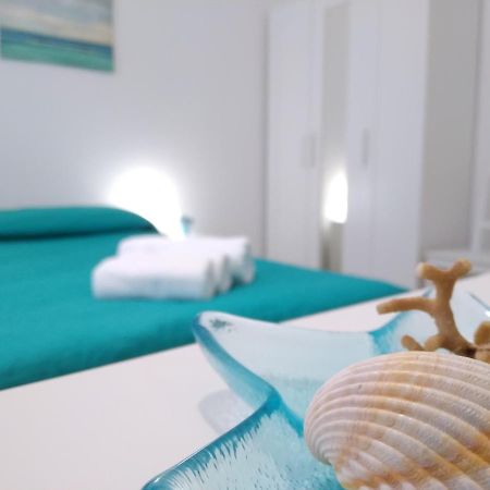 Casa Vacanze Oasis Home Portopino Porto Pino Exterior foto