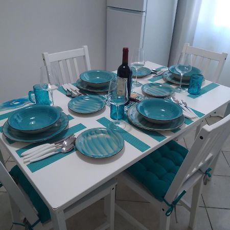 Casa Vacanze Oasis Home Portopino Porto Pino Exterior foto