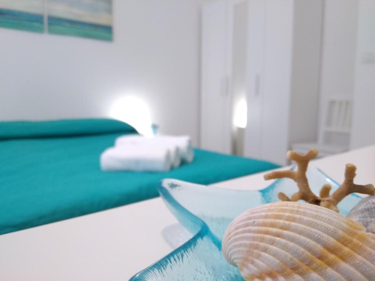 Casa Vacanze Oasis Home Portopino Porto Pino Exterior foto