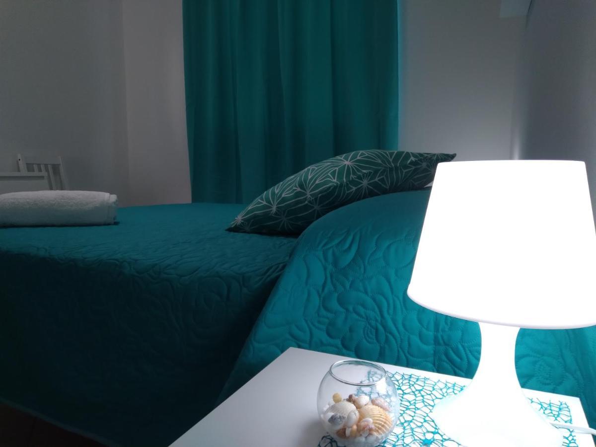 Casa Vacanze Oasis Home Portopino Porto Pino Exterior foto
