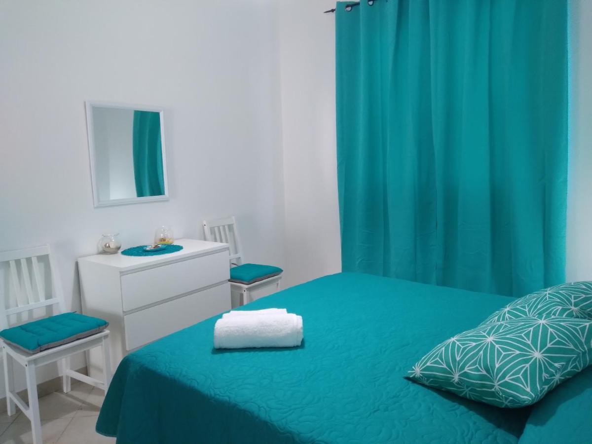 Casa Vacanze Oasis Home Portopino Porto Pino Exterior foto