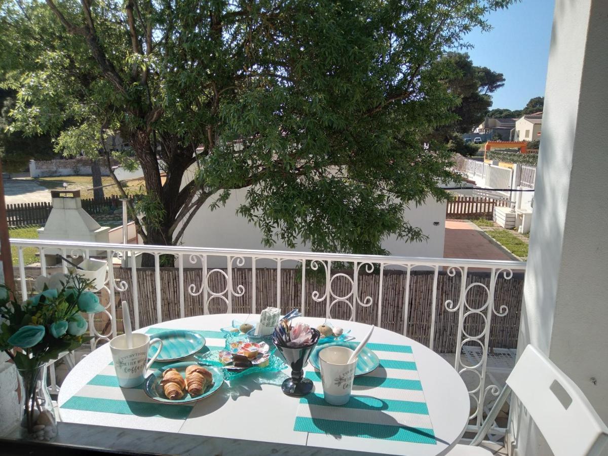 Casa Vacanze Oasis Home Portopino Porto Pino Exterior foto