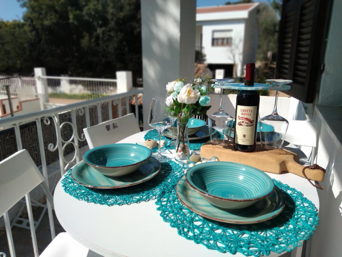 Casa Vacanze Oasis Home Portopino Porto Pino Exterior foto