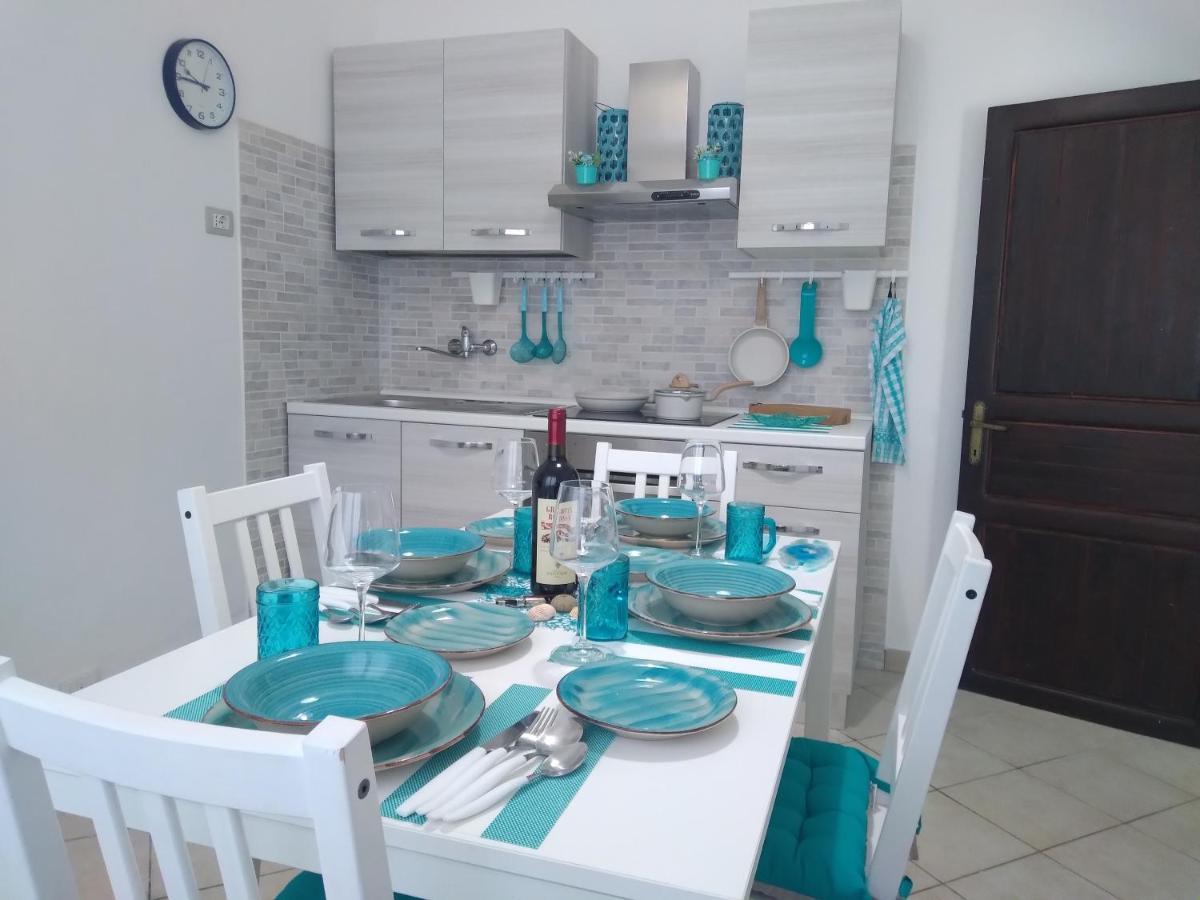 Casa Vacanze Oasis Home Portopino Porto Pino Exterior foto