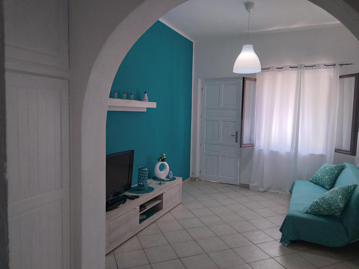 Casa Vacanze Oasis Home Portopino Porto Pino Exterior foto