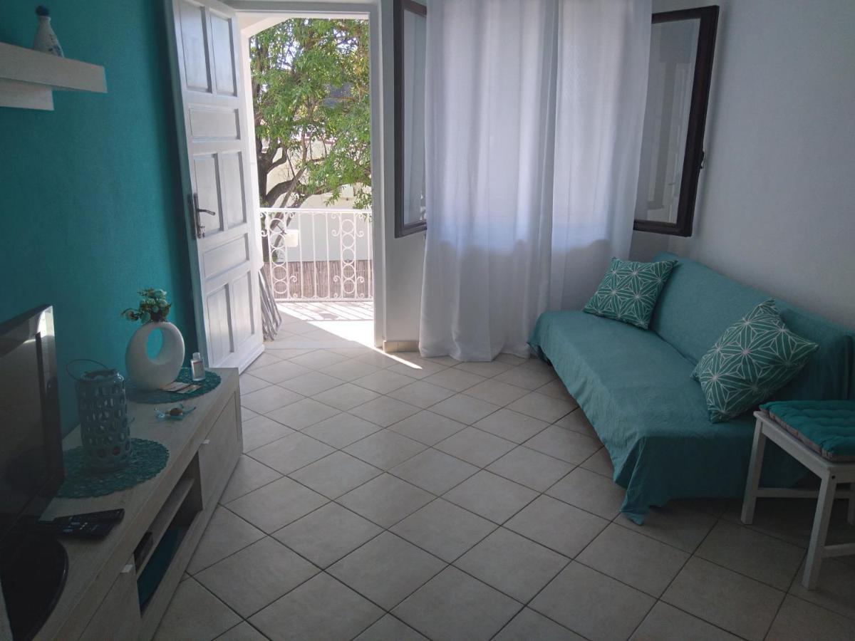 Casa Vacanze Oasis Home Portopino Porto Pino Exterior foto