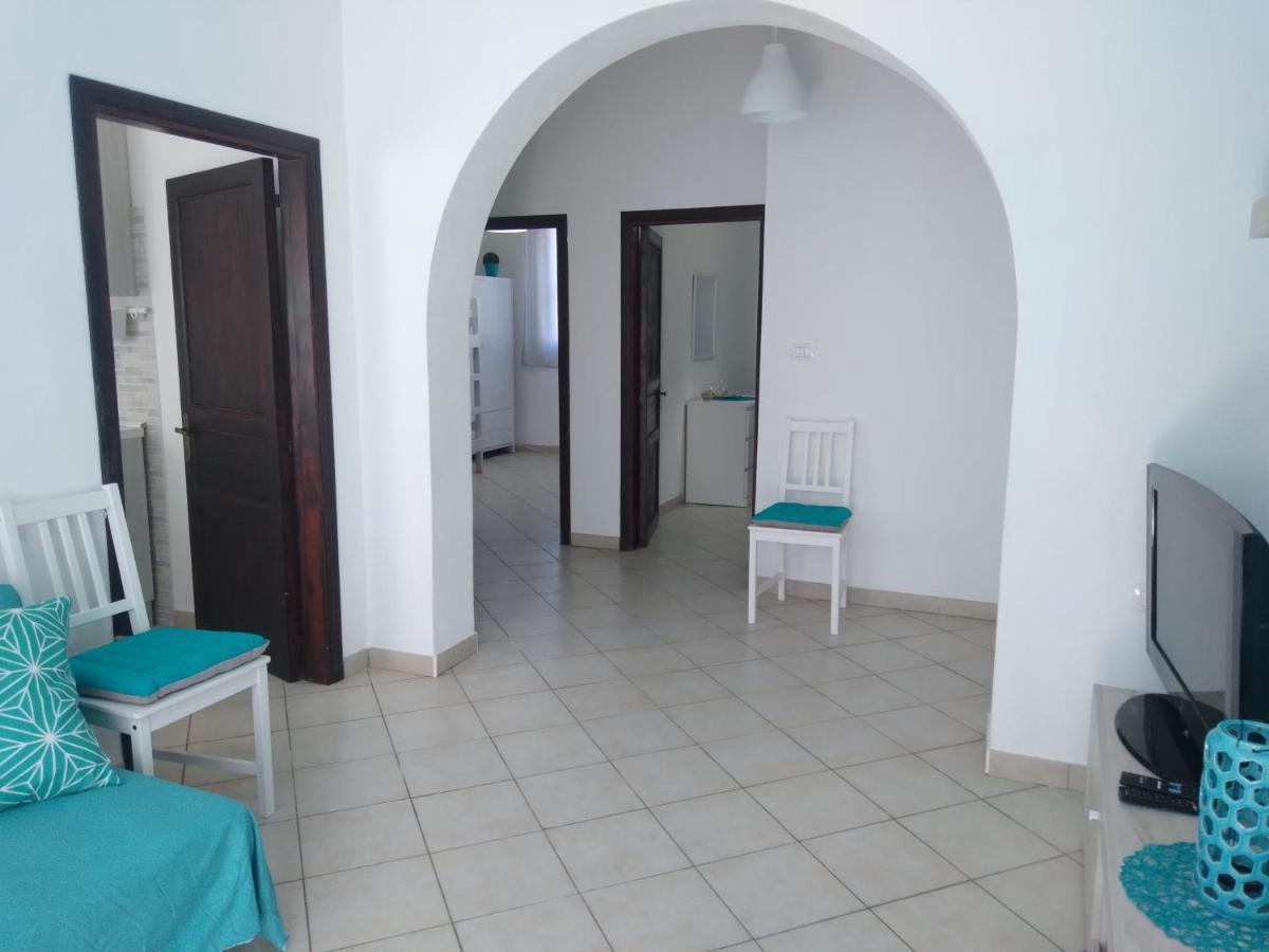 Casa Vacanze Oasis Home Portopino Porto Pino Exterior foto