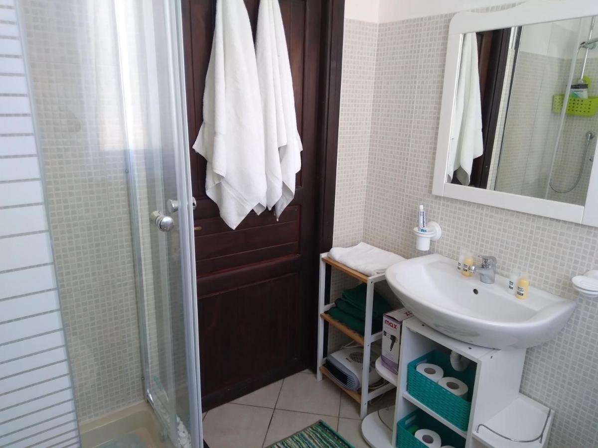 Casa Vacanze Oasis Home Portopino Porto Pino Exterior foto