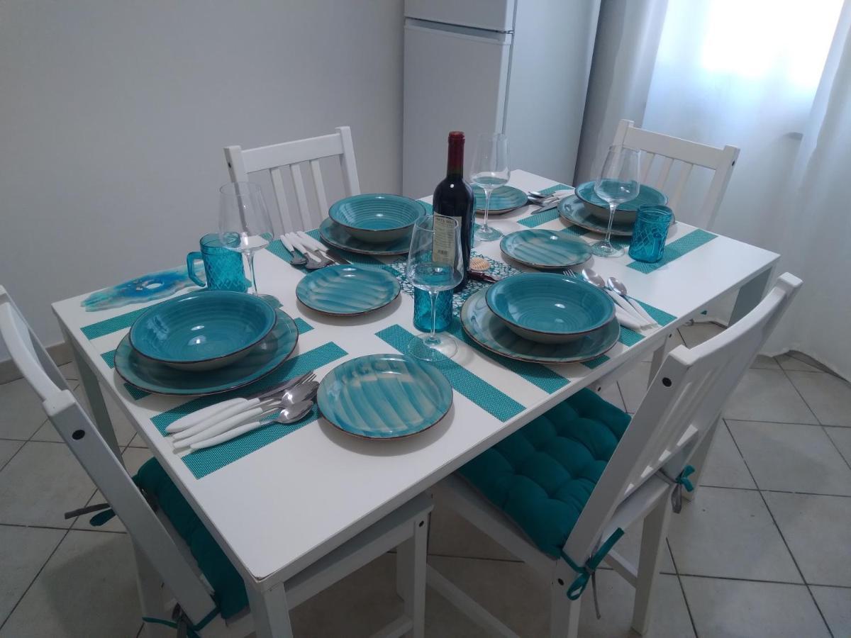 Casa Vacanze Oasis Home Portopino Porto Pino Exterior foto