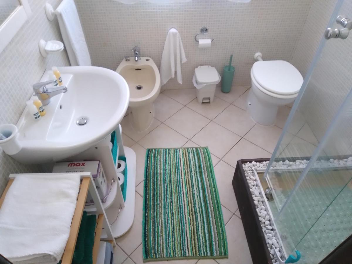 Casa Vacanze Oasis Home Portopino Porto Pino Exterior foto