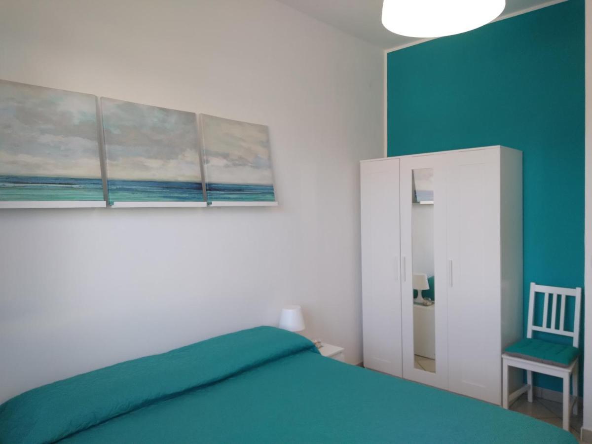 Casa Vacanze Oasis Home Portopino Porto Pino Exterior foto